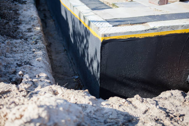 Professional Waterproofing technician working in Delafield, WI